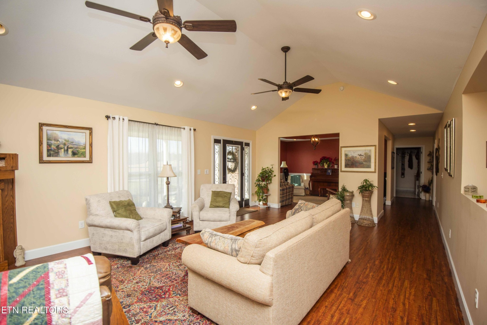 174 Spring Cove Lane Spring City, TN 37381 - Photo 6 of 50 a living room with furniture and a chandelier