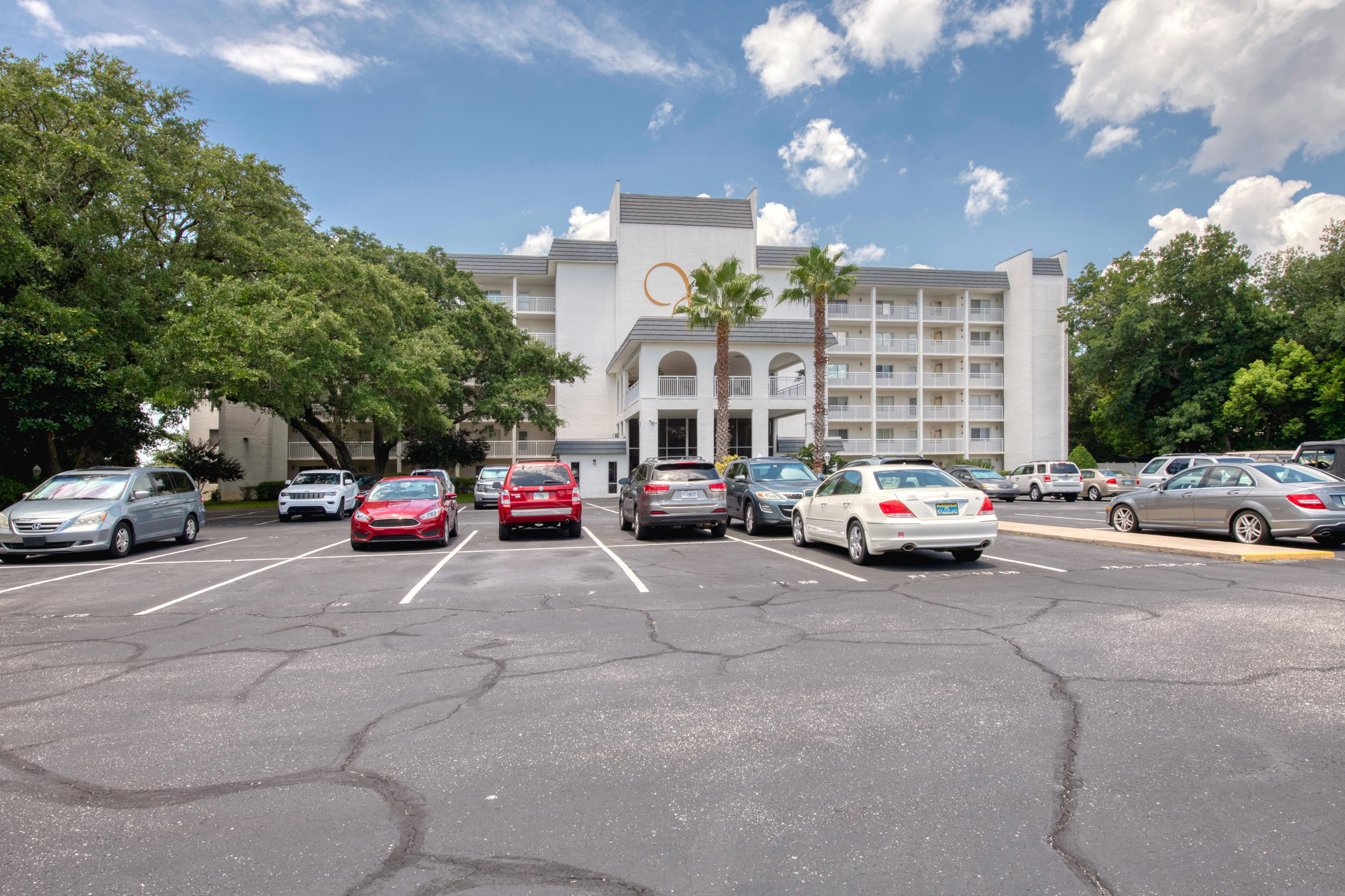 151 Calhoun Avenue, Unit 409 Destin, FL 32541 - Photo 15 of 15 a view of a cars parked in a parking lot