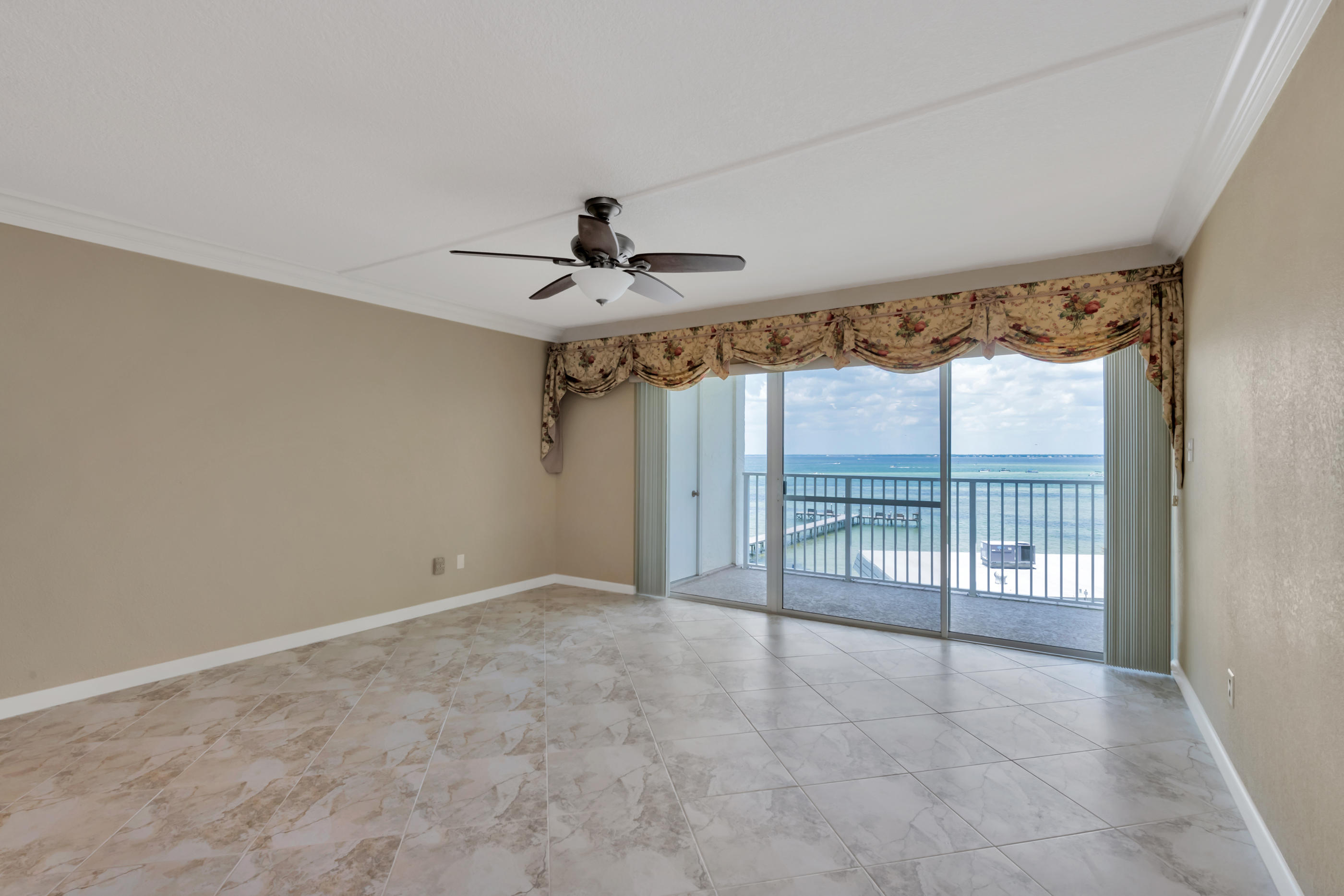 151 Calhoun Avenue, Unit 409 Destin, FL 32541 - Photo 6 of 15 a view of an empty room with a window