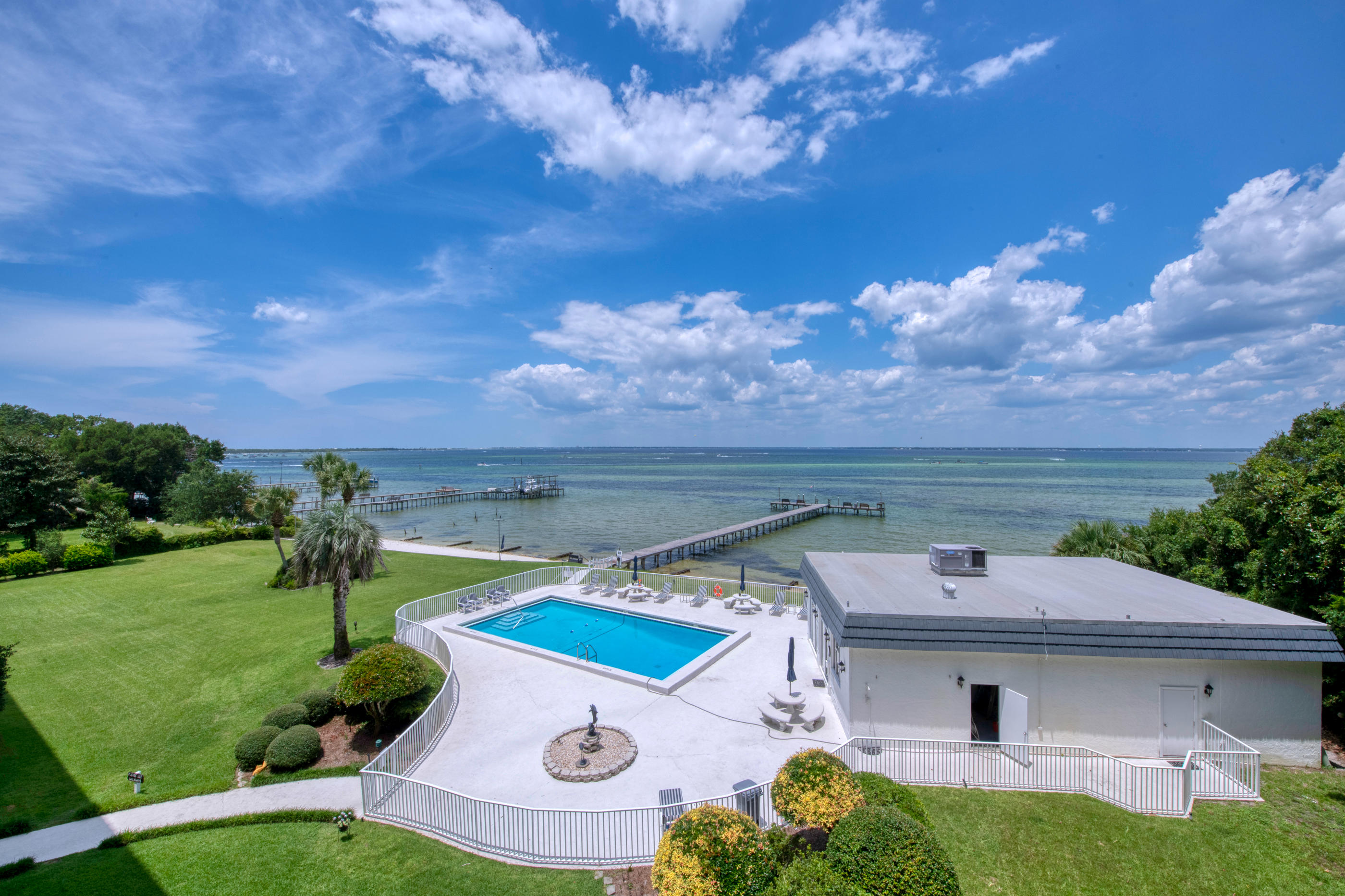 151 Calhoun Avenue, Unit 409 Destin, FL 32541 - Photo 9 of 15 a view of a house with a yard