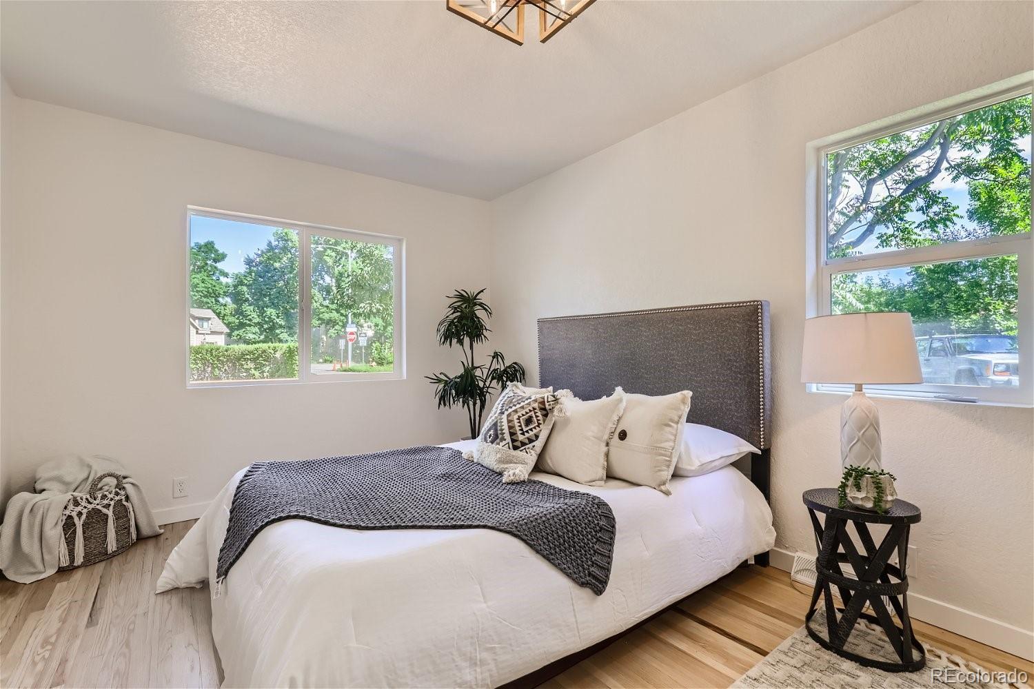 3090 Pierce Street Wheat Ridge, CO 80214 - Photo 17 of 28 a bedroom with a bed and window