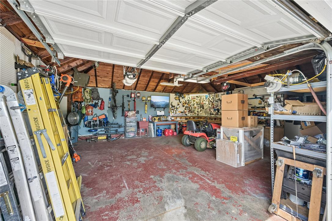 4065 Airport Road Allentown, PA 18109 - Photo 20 of 28 A well-equipped garage offers extensive storage and a dedicated workspace for all your projects.