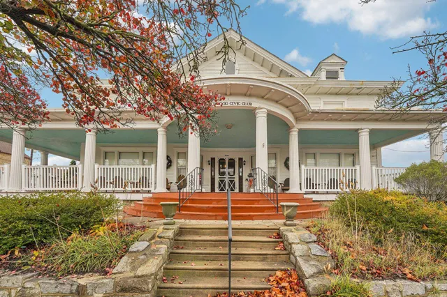 a view of a building with a porch