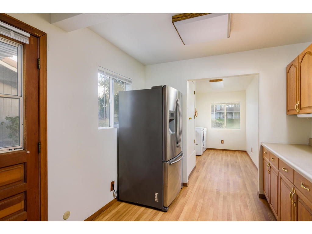 14803 Fruitvale Road Valley Center, CA 92082 - Photo 14 of 25 Extended laundry/mud room.