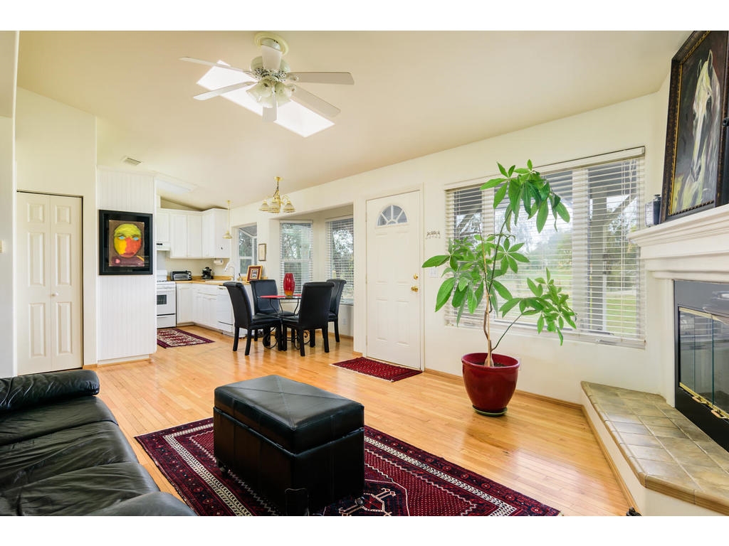14803 Fruitvale Road Valley Center, CA 92082 - Photo 19 of 25 Family Room view to dining and kitchen.