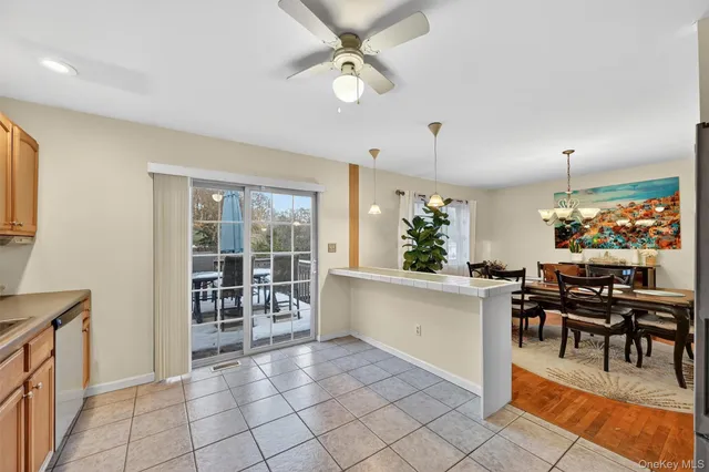 a view of a dining room kitchen and a window