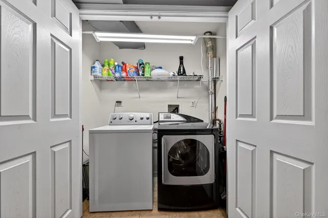 a view of a patio with iron fence
