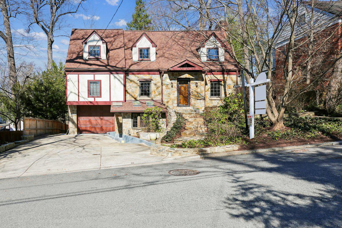6317 Poe Road Bethesda, MD 20817 - Photo 2 of 43 a view of a building with a street