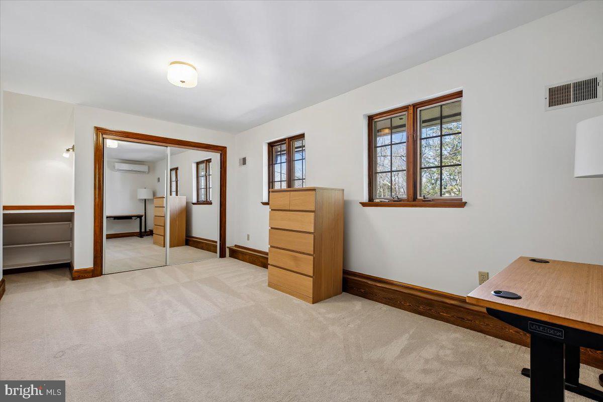 6317 Poe Road Bethesda, MD 20817 - Photo 30 of 43 a room with furniture and a closet