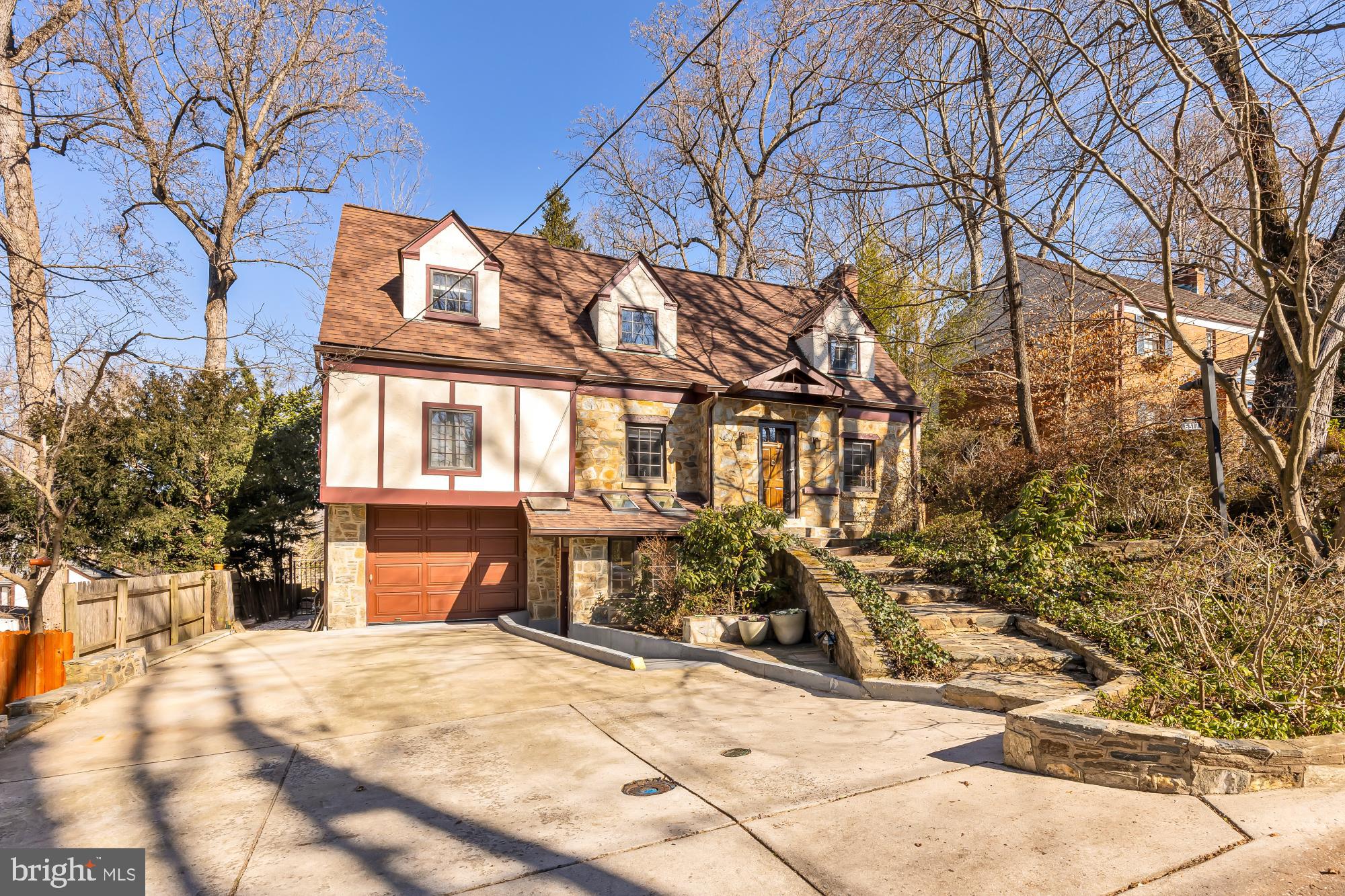 6317 Poe Road Bethesda, MD 20817 - Photo 3 of 43 a view of a house with a patio