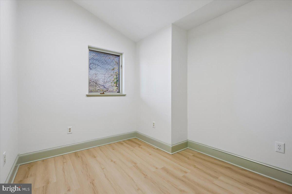 6317 Poe Road Bethesda, MD 20817 - Photo 32 of 43 an empty room with a bench
