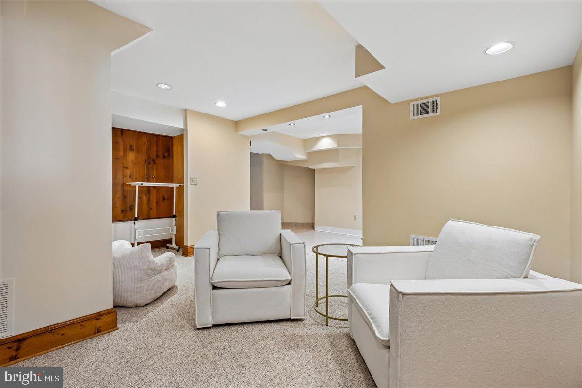 6317 Poe Road Bethesda, MD 20817 - Photo 35 of 43 a living room with furniture and a window