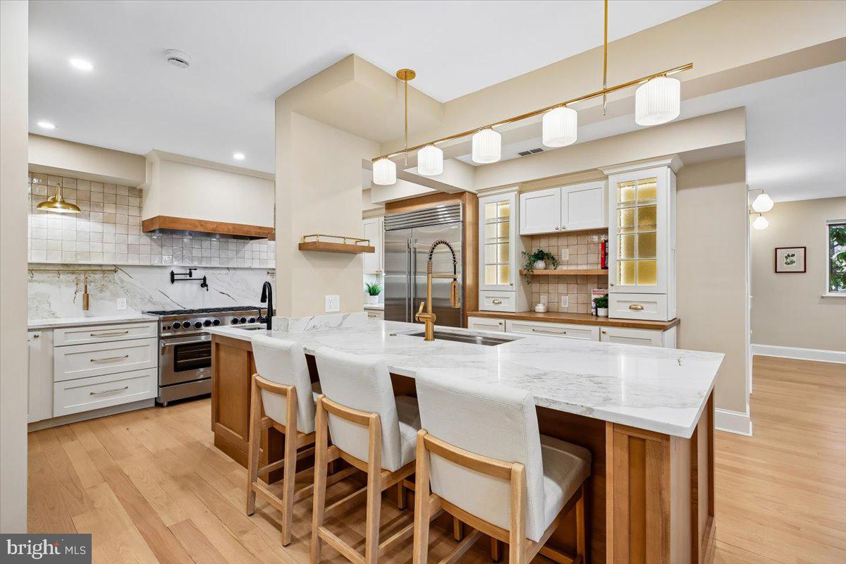 6317 Poe Road Bethesda, MD 20817 - Photo 4 of 43 a kitchen with cabinets a sink and appliances