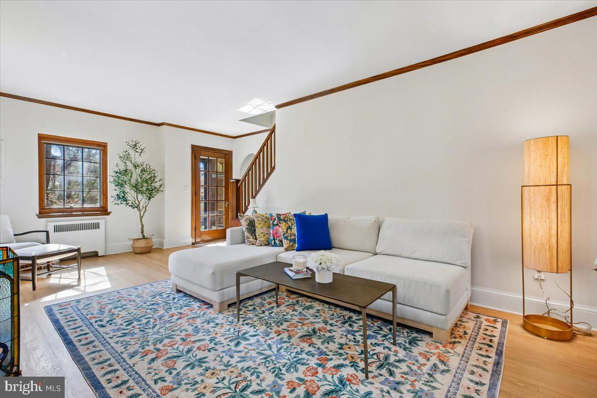 6317 Poe Road Bethesda, MD 20817 - Photo 6 of 43 a living room with a couch and a table