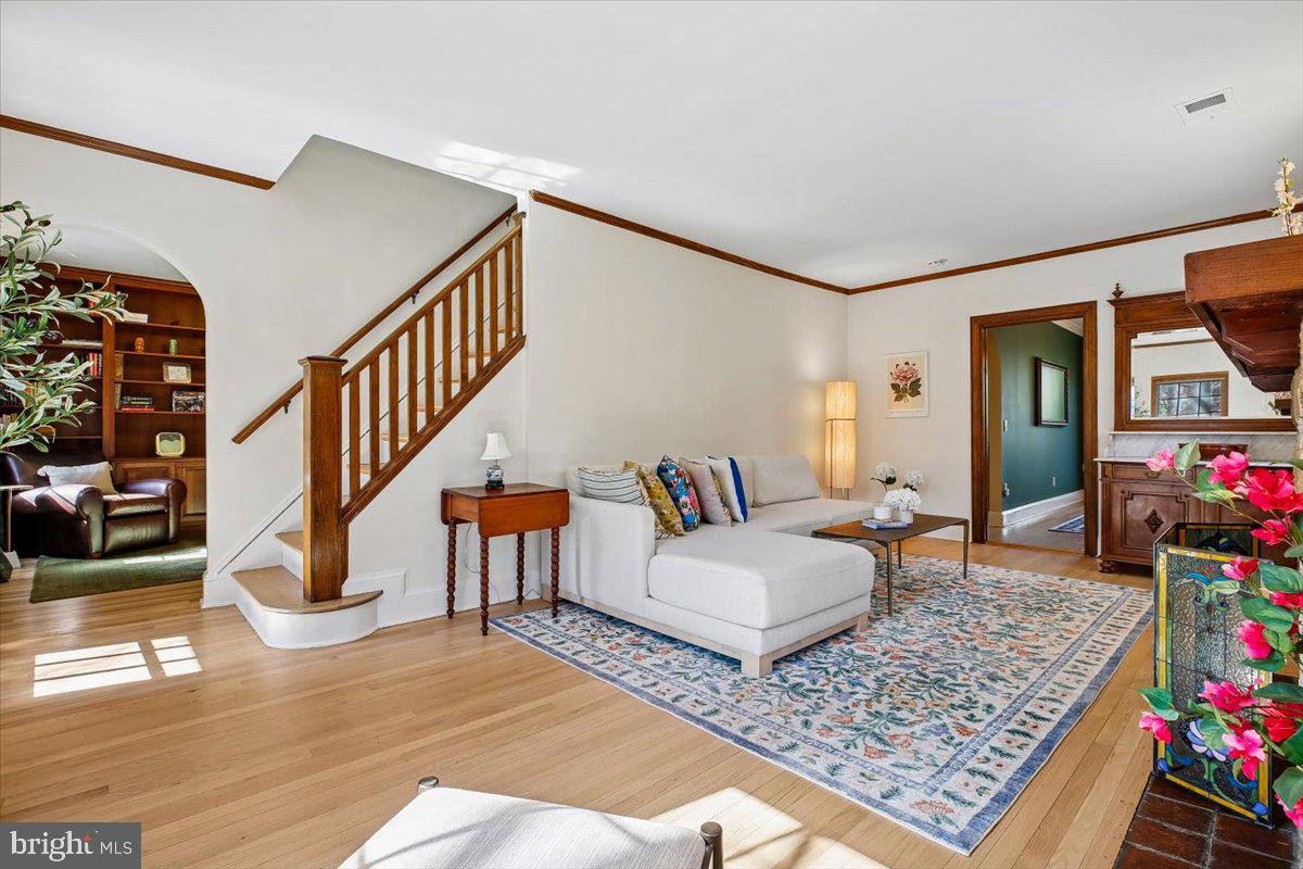 6317 Poe Road Bethesda, MD 20817 - Photo 7 of 43 a living room with furniture and wooden floor