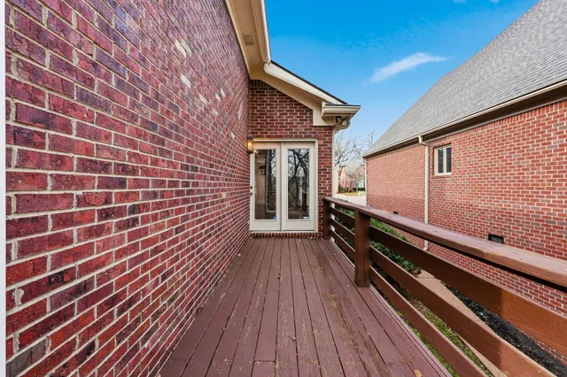 a view of an empty room with closet