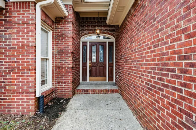 a front view of a house with a door