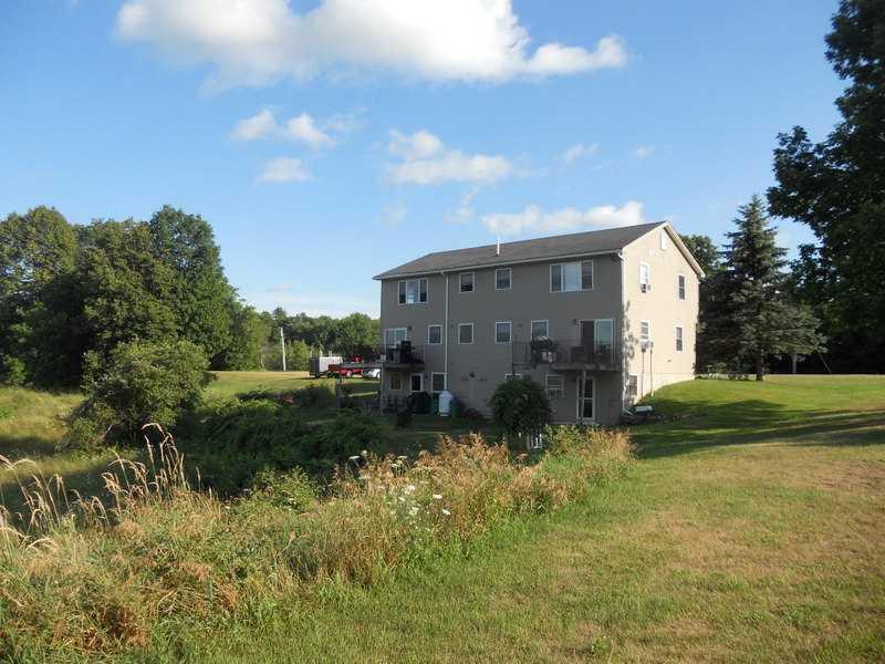 193 Dyer Road Biddeford, ME 04005 - Photo 2 of 10 Exterior Back. two units have decks...