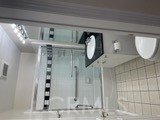 255 North Michigan Avenue Pasadena, CA 91106 - Photo 7 of 18 a bathroom with a mirror and a shower