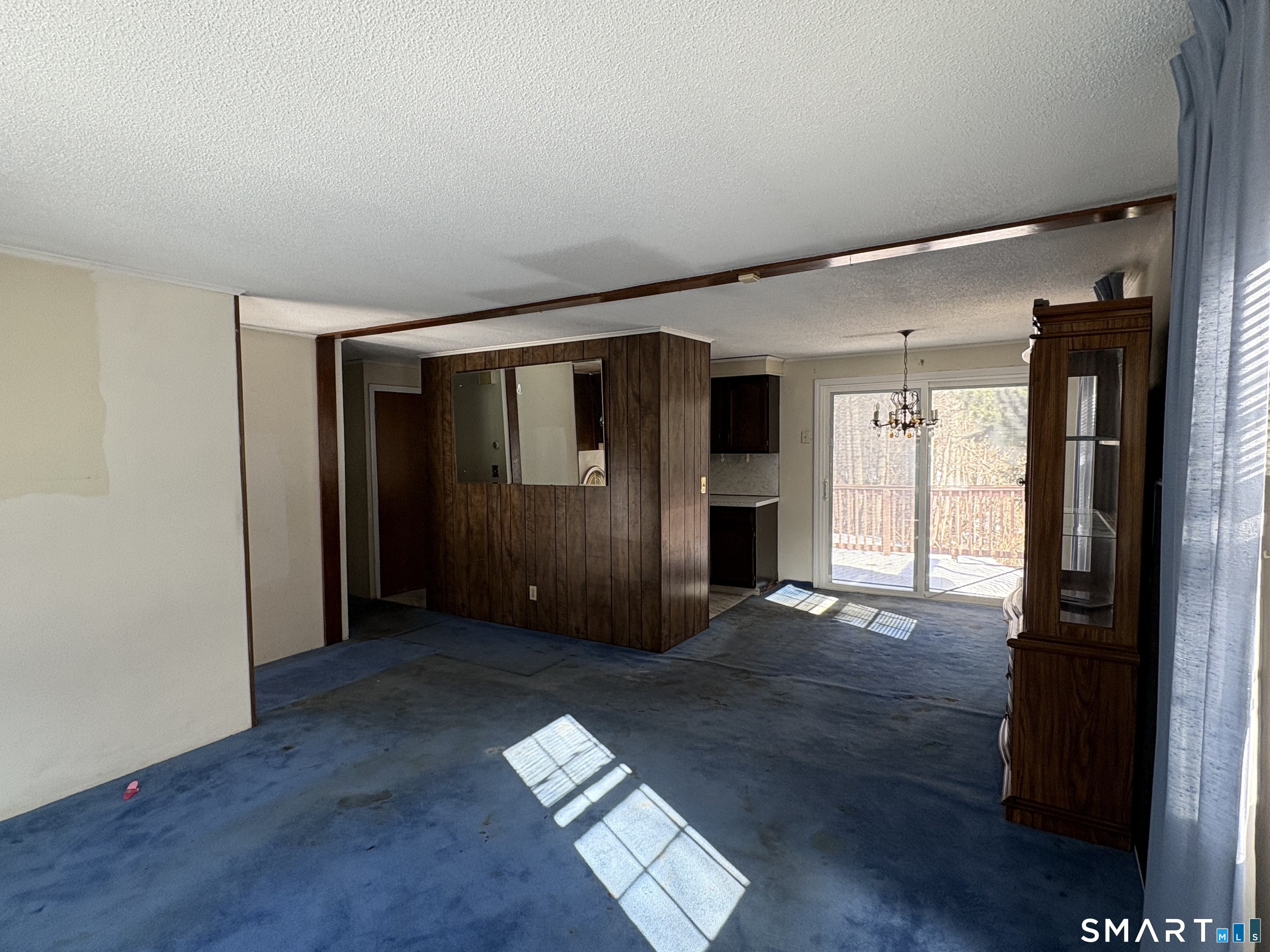 249 Malcolm Road West Haven, CT 06516 - Photo 16 of 17 a view of an empty room with wooden floor and a window