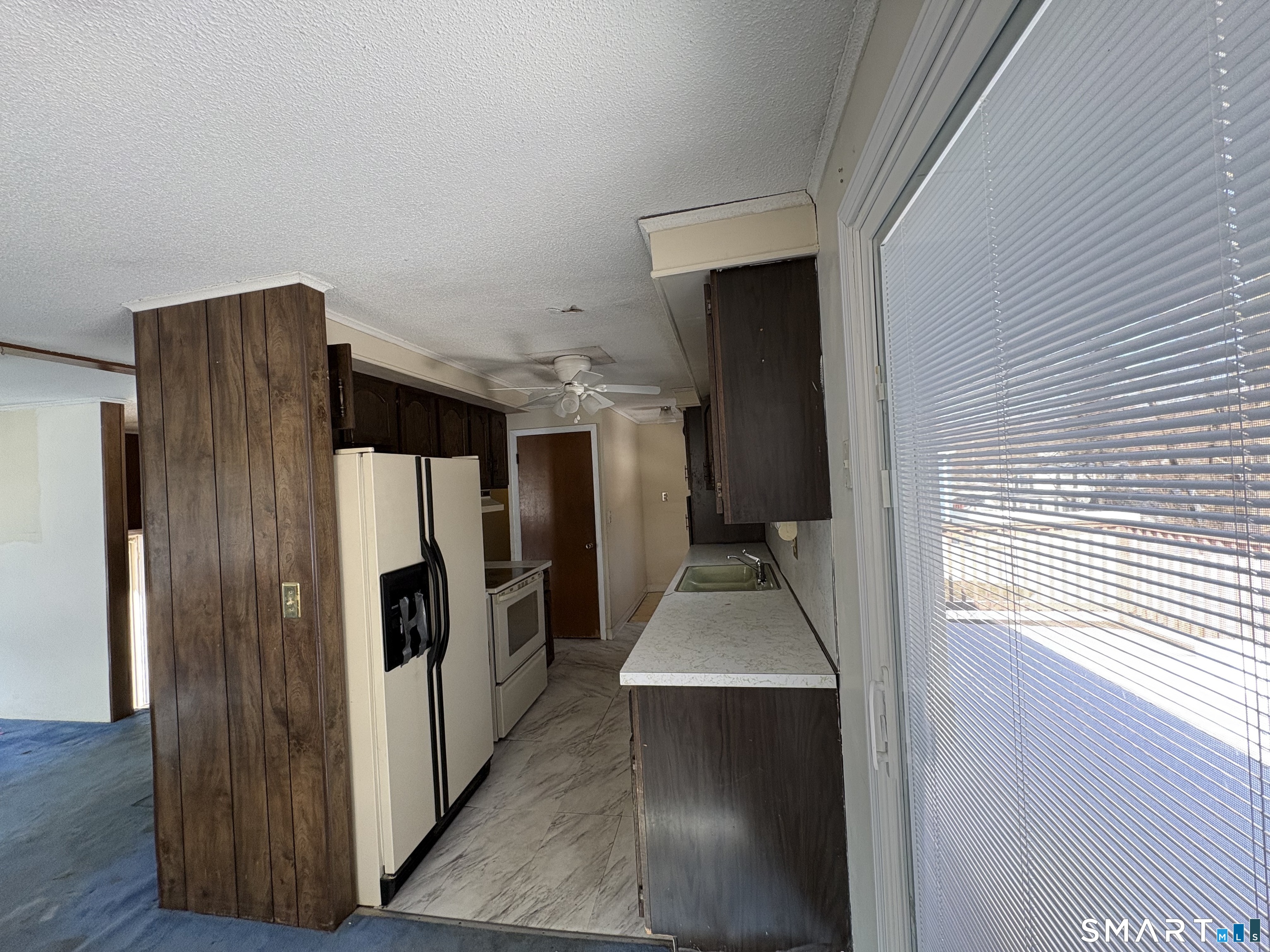 249 Malcolm Road West Haven, CT 06516 - Photo 3 of 17 a view of a kitchen from the hallway