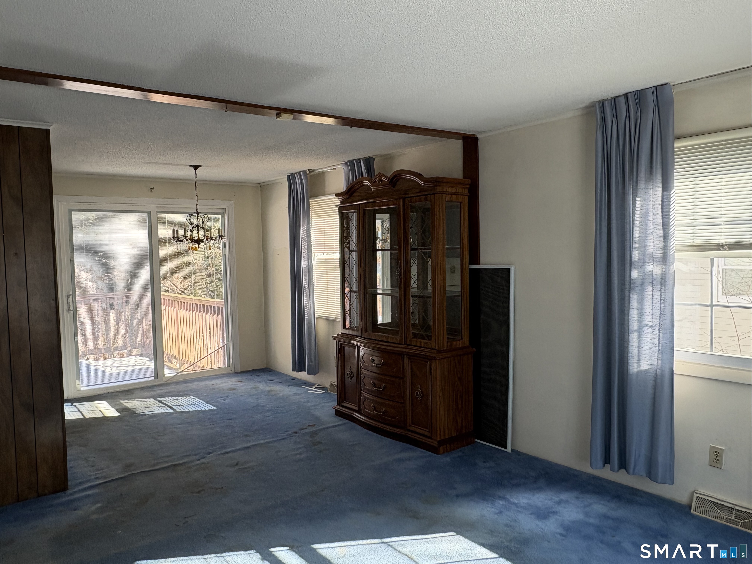 249 Malcolm Road West Haven, CT 06516 - Photo 7 of 17 a view of empty room with wooden floor and fan