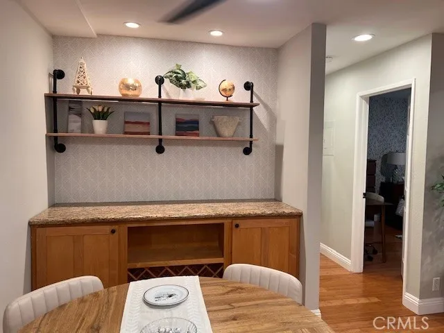 a view of living room with furniture and window