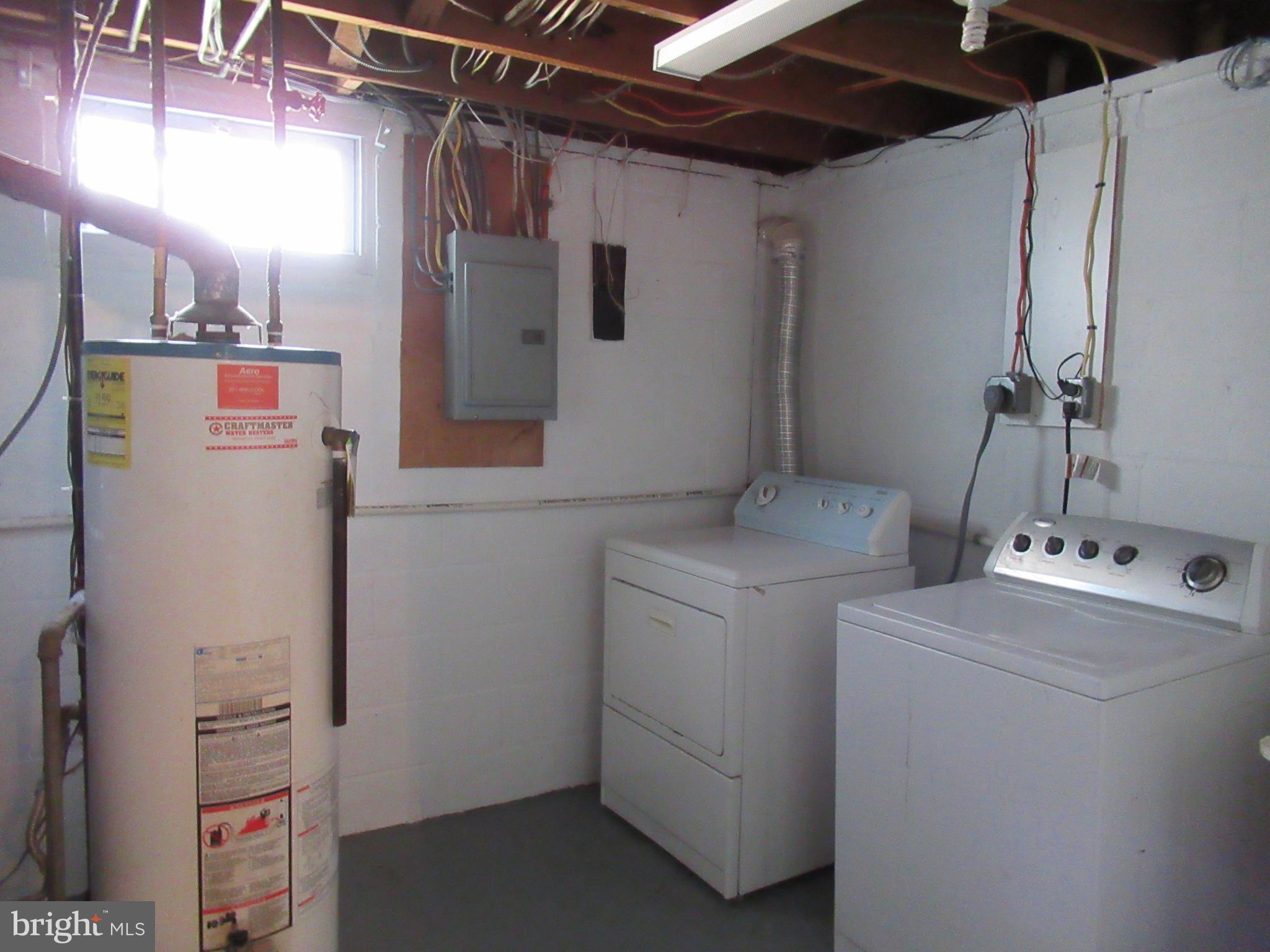 5608 Berwyn Road Berwyn Heights, MD 20740 - Photo 14 of 24 a utility room with dryer and washer
