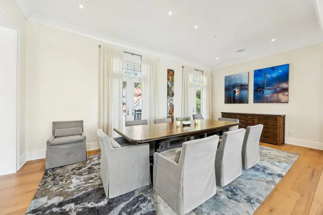 a white bath tub sitting next to a white sink