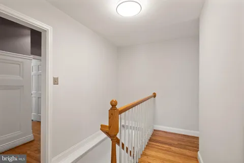 a bedroom with a bed and a walk in closet