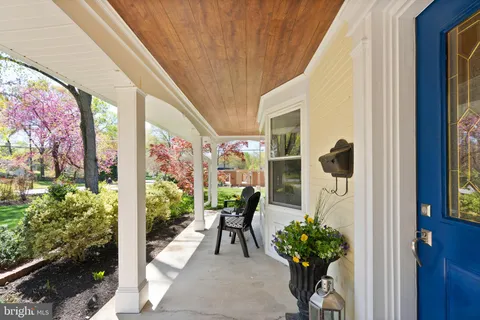 a view of entryway and livingroom with wooden floor