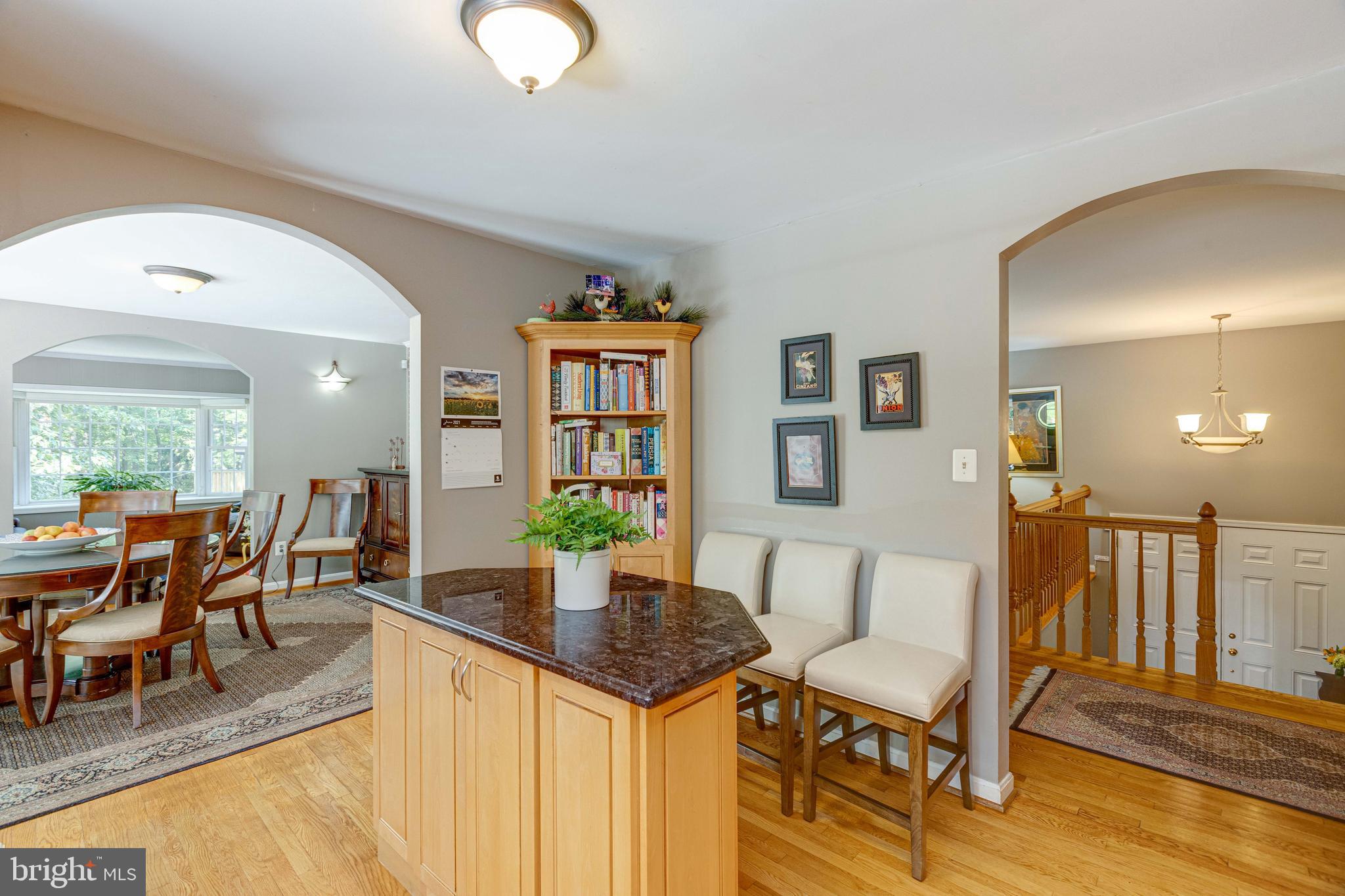 2408 Old Trace Lane Reston, VA 20191 - Photo 11 of 45 Kitchen opening to dining room and living room