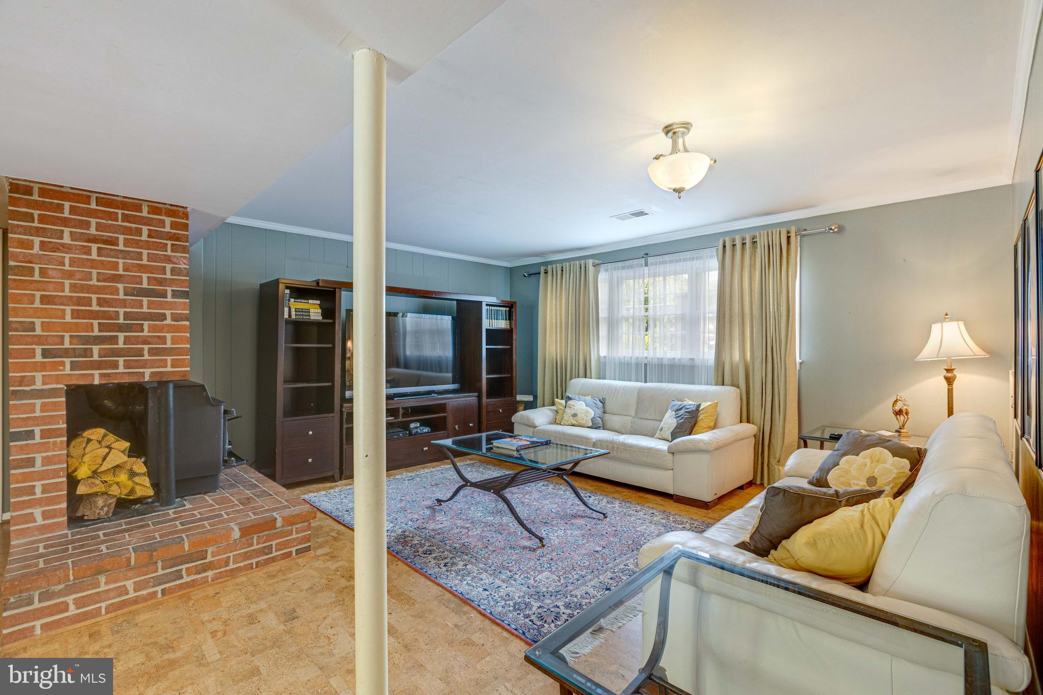 2408 Old Trace Lane Reston, VA 20191 - Photo 33 of 45 Lower level opening to patio with wood stove
