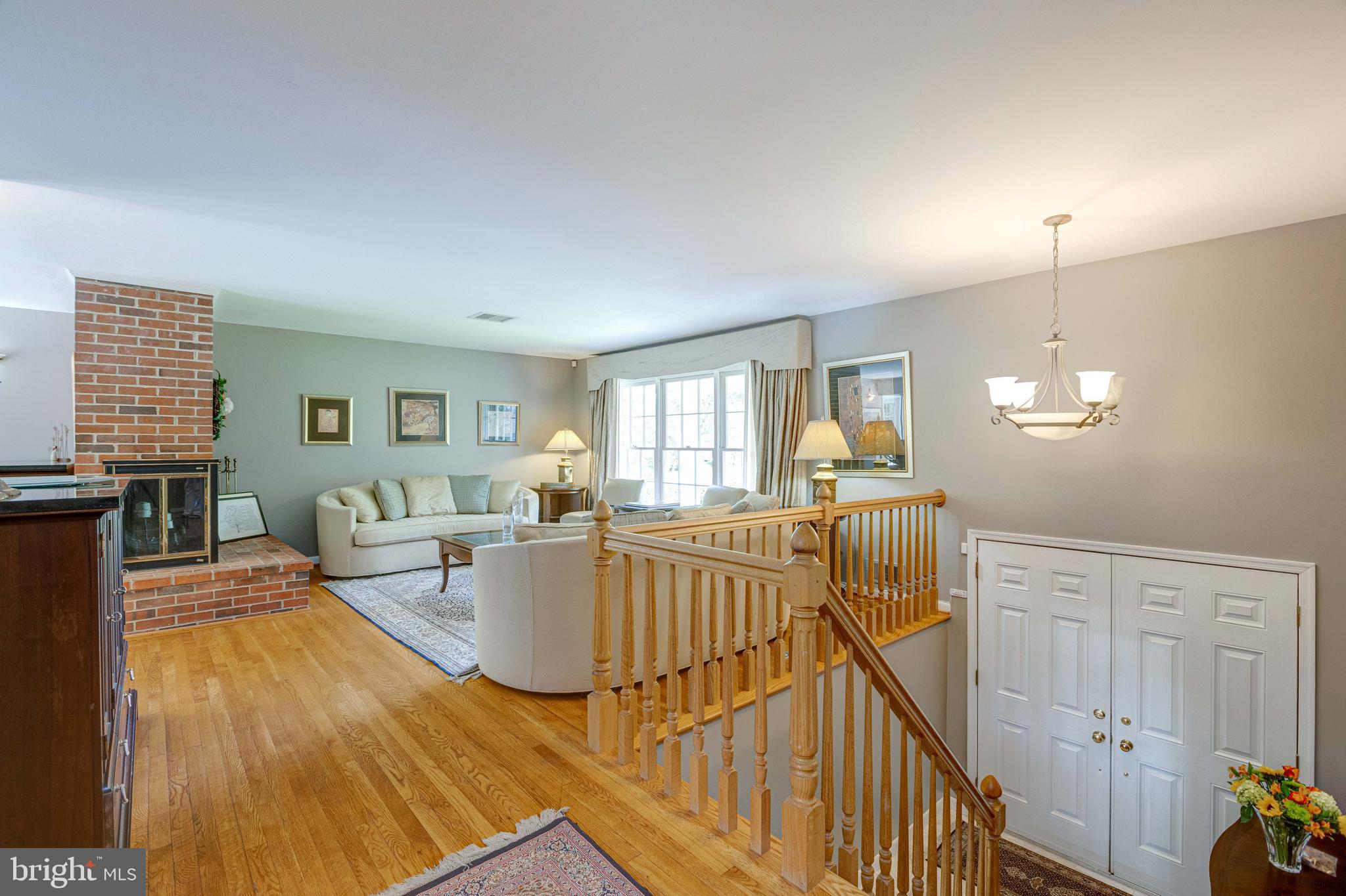 2408 Old Trace Lane Reston, VA 20191 - Photo 6 of 45 Living room with natural light and hardwood floor