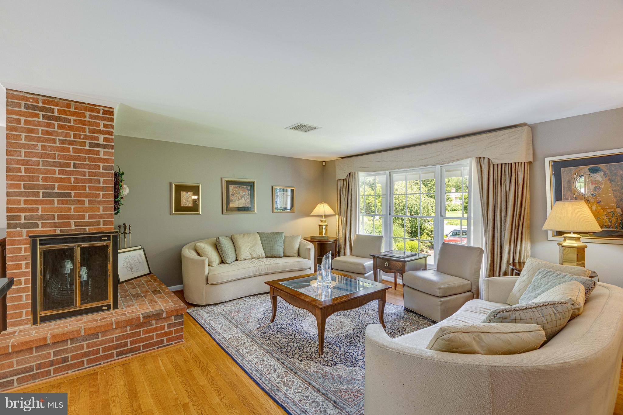 2408 Old Trace Lane Reston, VA 20191 - Photo 7 of 45 Living room with natural light and hardwood floor