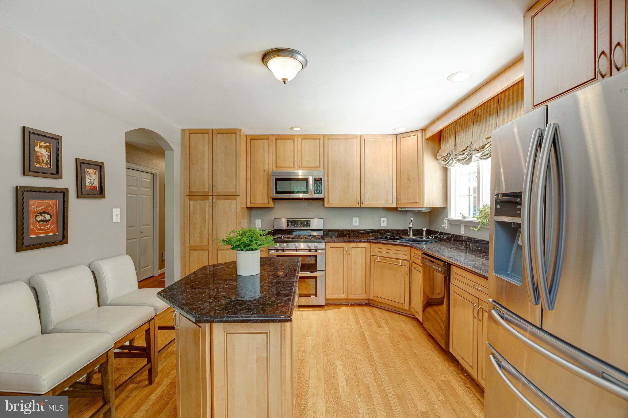 2408 Old Trace Lane Reston, VA 20191 - Photo 10 of 45 Spacious updated kitchen opening to dining room