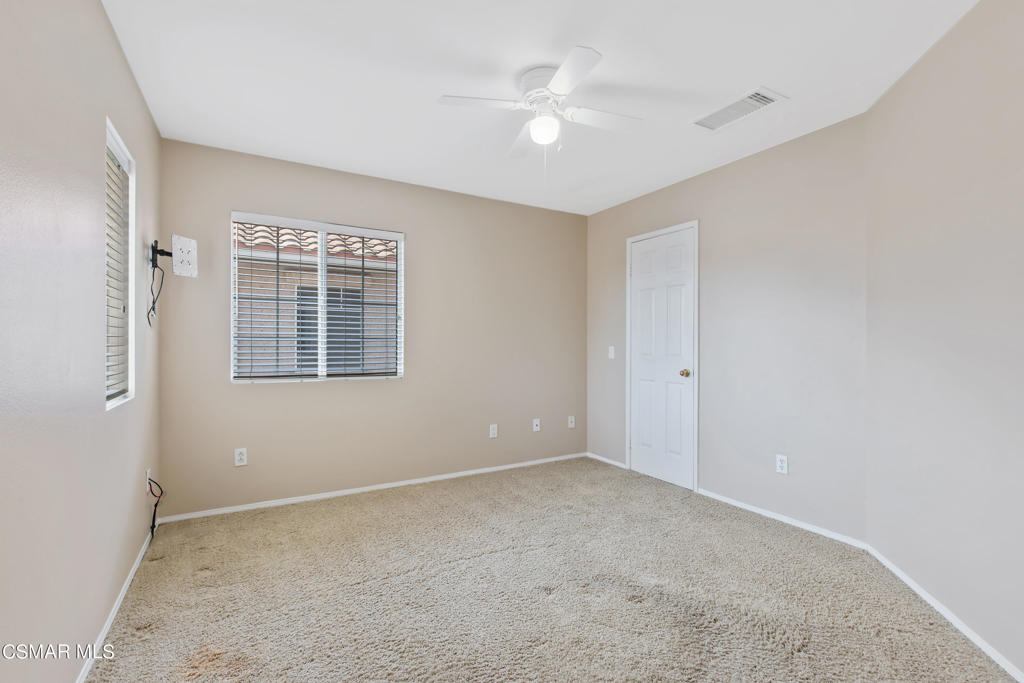 869 Aloe Lane Simi Valley, CA 93065 - Photo 22 of 31 a view of an empty room with a window
