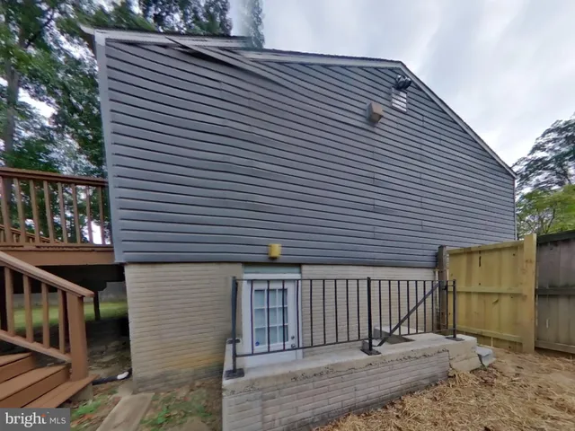 a front view of a house with a garage
