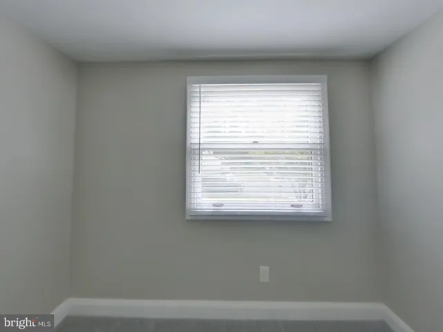 a view of a small space with a window