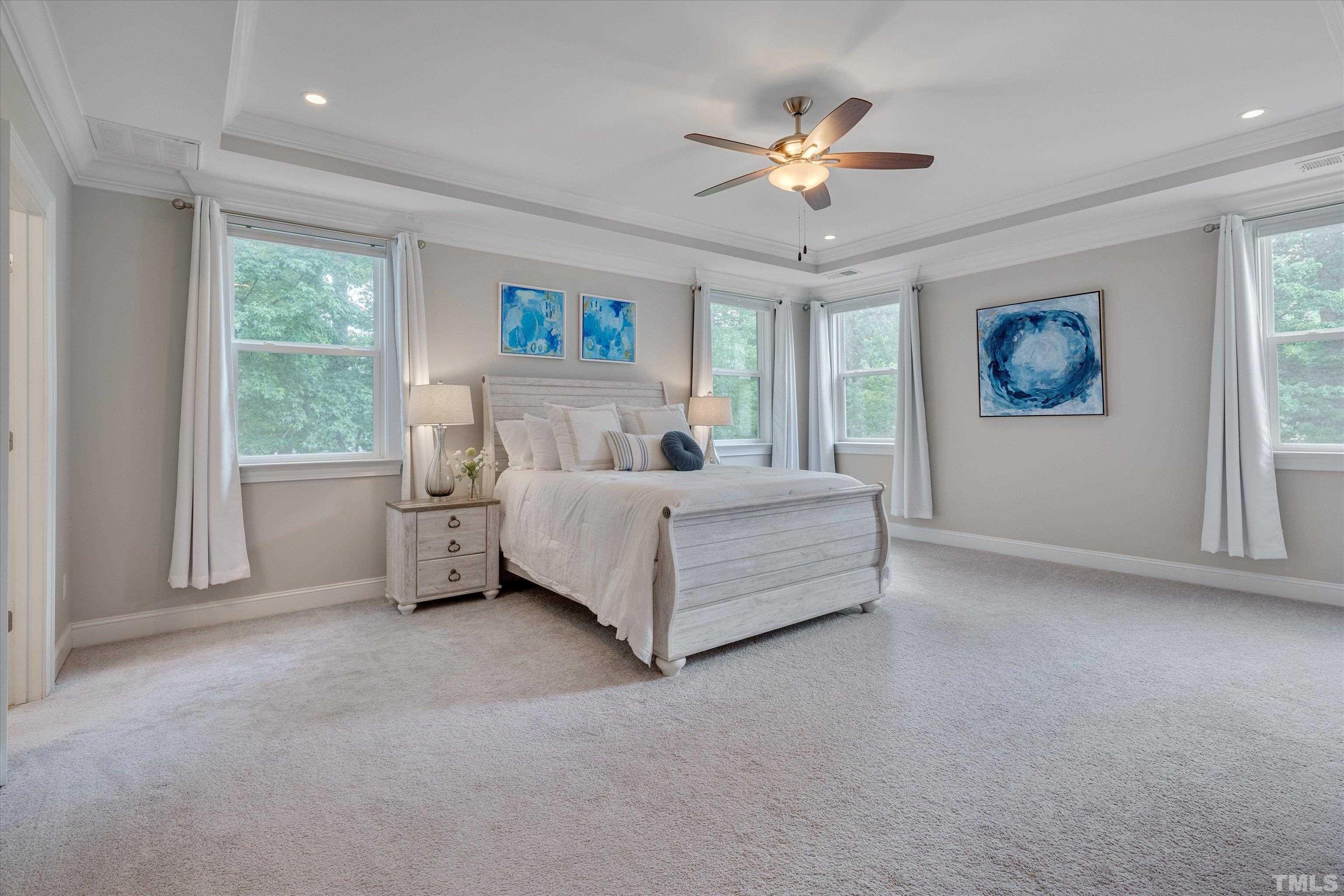 8012 Shree Court Raleigh, NC 27613 - Photo 27 of 49 a bed room with bed and a window