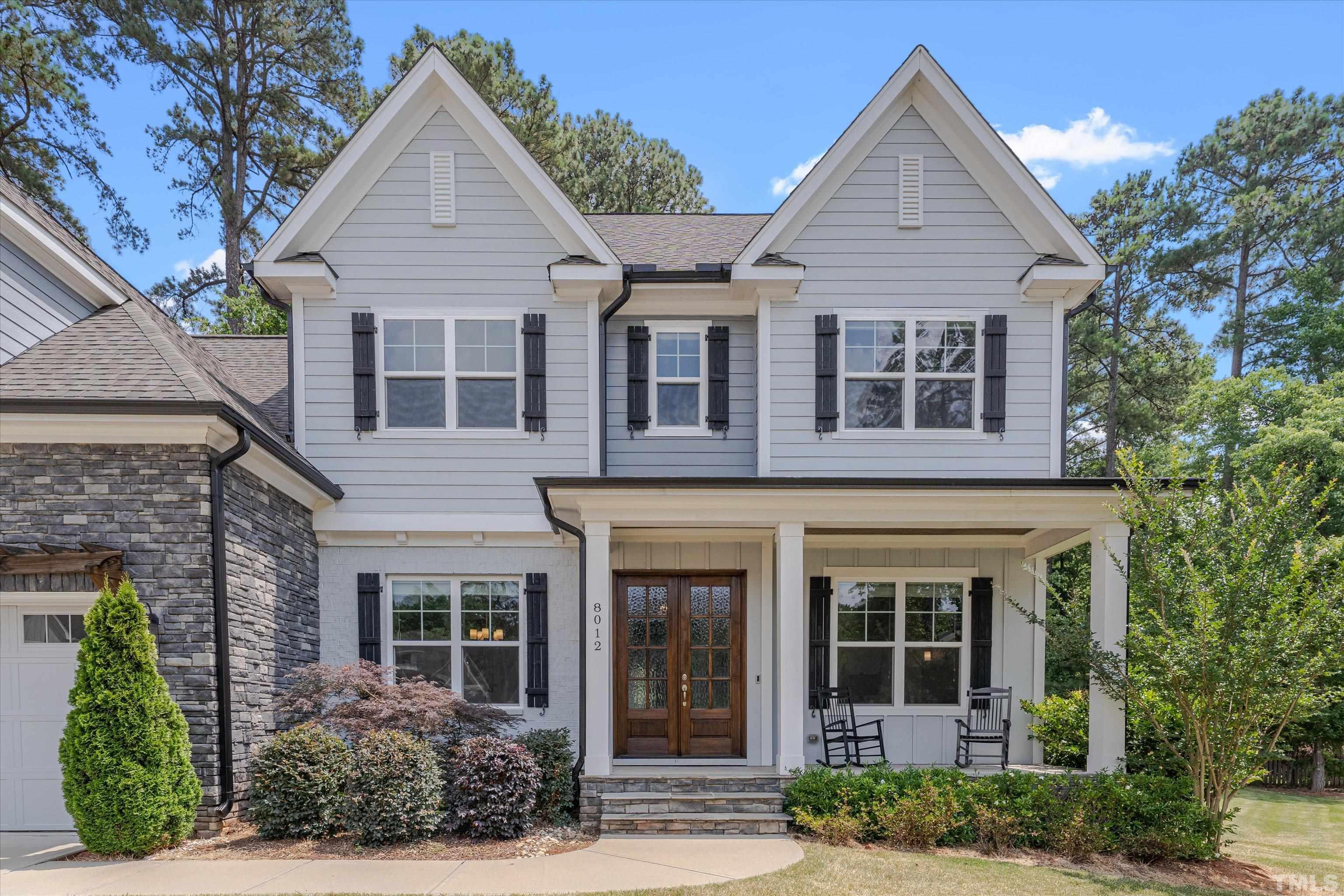 8012 Shree Court Raleigh, NC 27613 - Photo 3 of 49 front view of a house with a yard