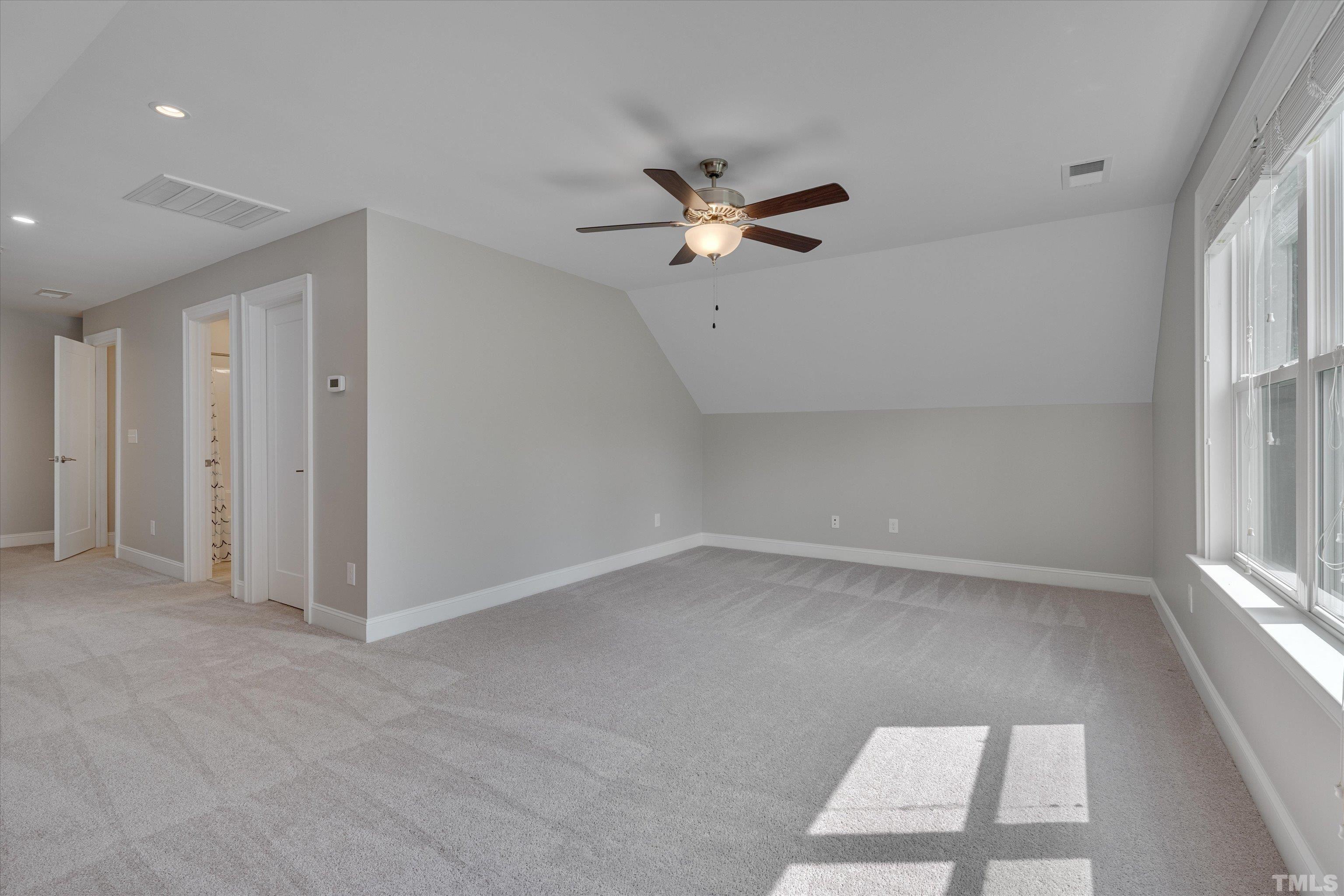 8012 Shree Court Raleigh, NC 27613 - Photo 41 of 49 an empty room with a window