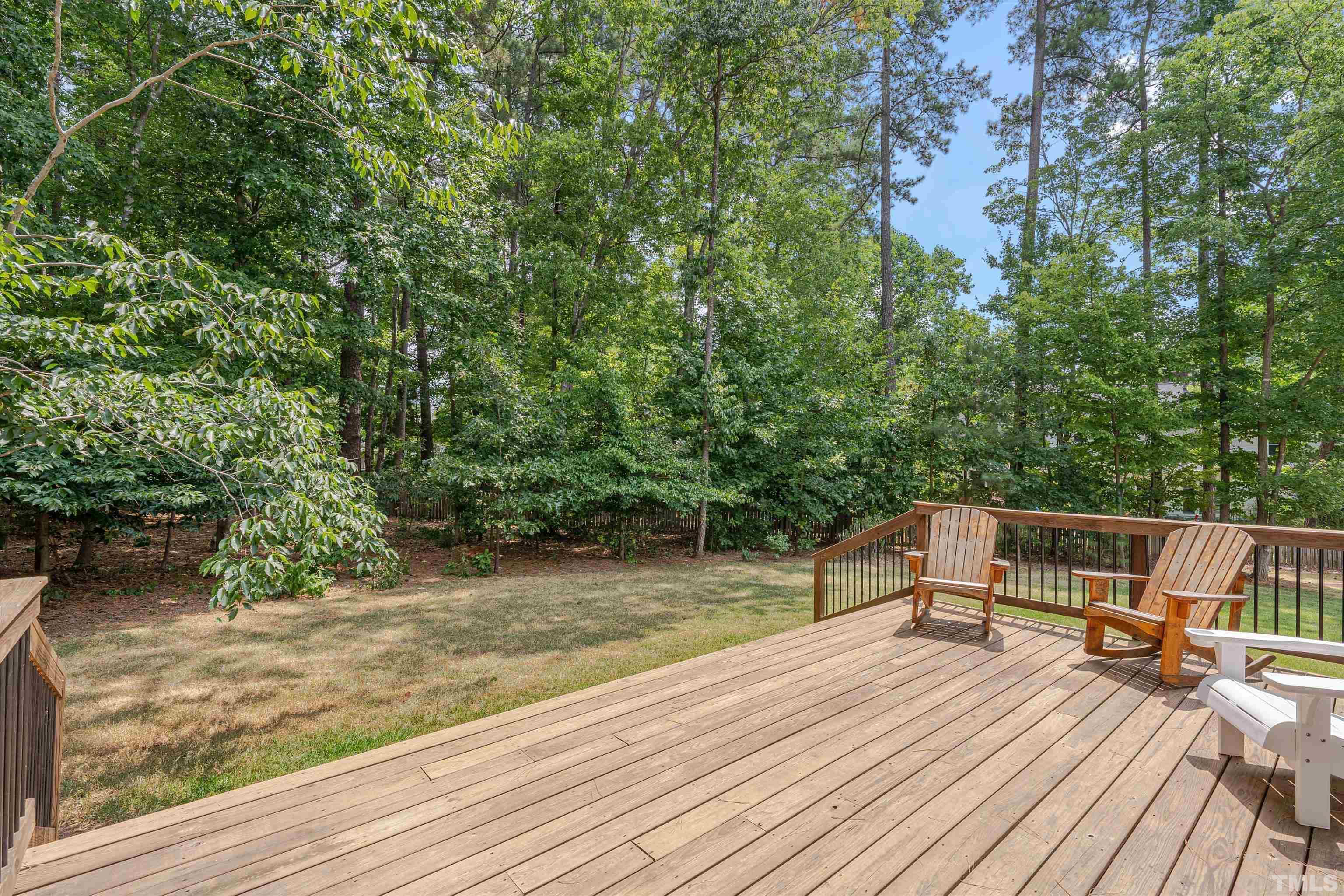 8012 Shree Court Raleigh, NC 27613 - Photo 45 of 49 a view of balcony with wooden floor and seating space