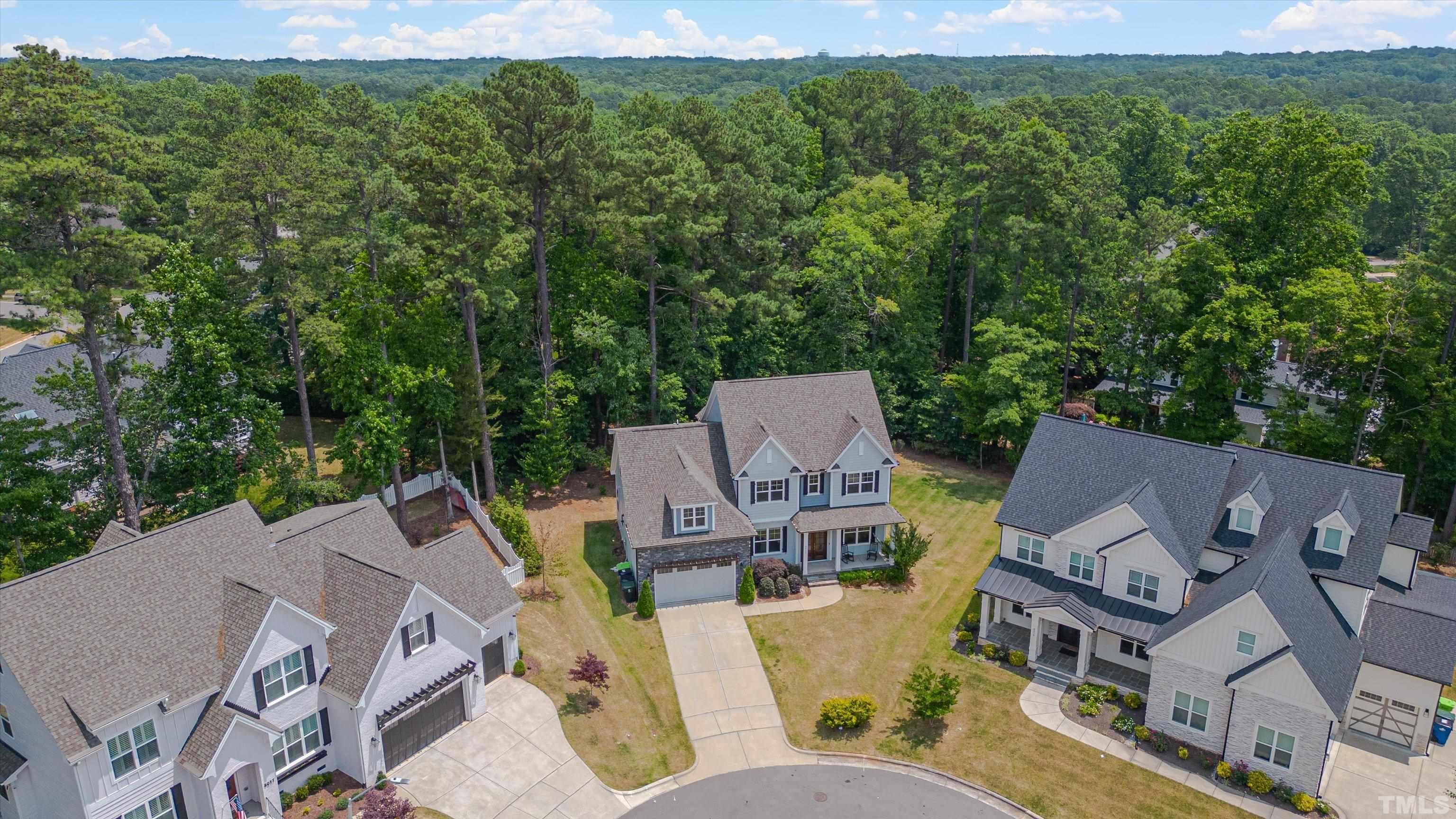 8012 Shree Court Raleigh, NC 27613 - Photo 47 of 49 an aerial view of a house with pool outdoor seating and yard