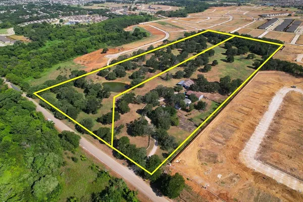 a view of swimming pool with a balcony