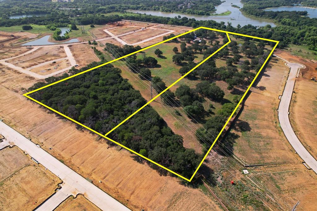 12029 Fishtrap Road Aubrey, TX 76227 - Photo 6 of 16 a view of a tennis court