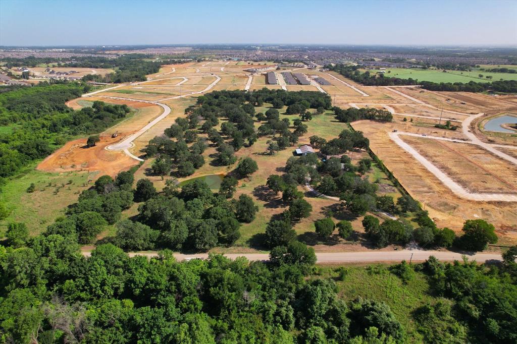 12029 Fishtrap Road Aubrey, TX 76227 - Photo 7 of 16 an aerial view of residential houses with outdoor space