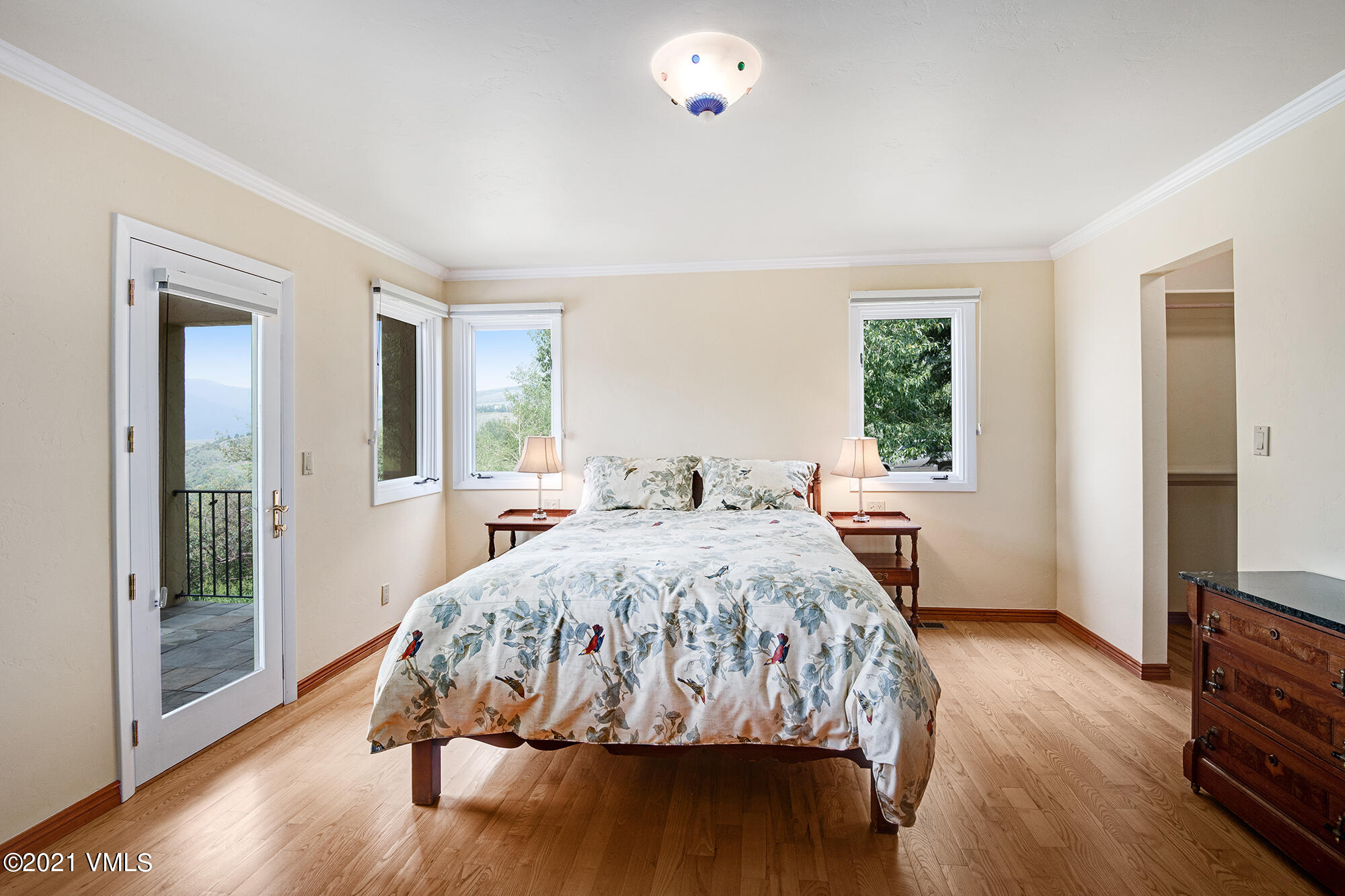 683 Eagle Crest Road Edwards, CO 81632 - Photo 21 of 47 a bed sitting in a spacious bedroom next to a window