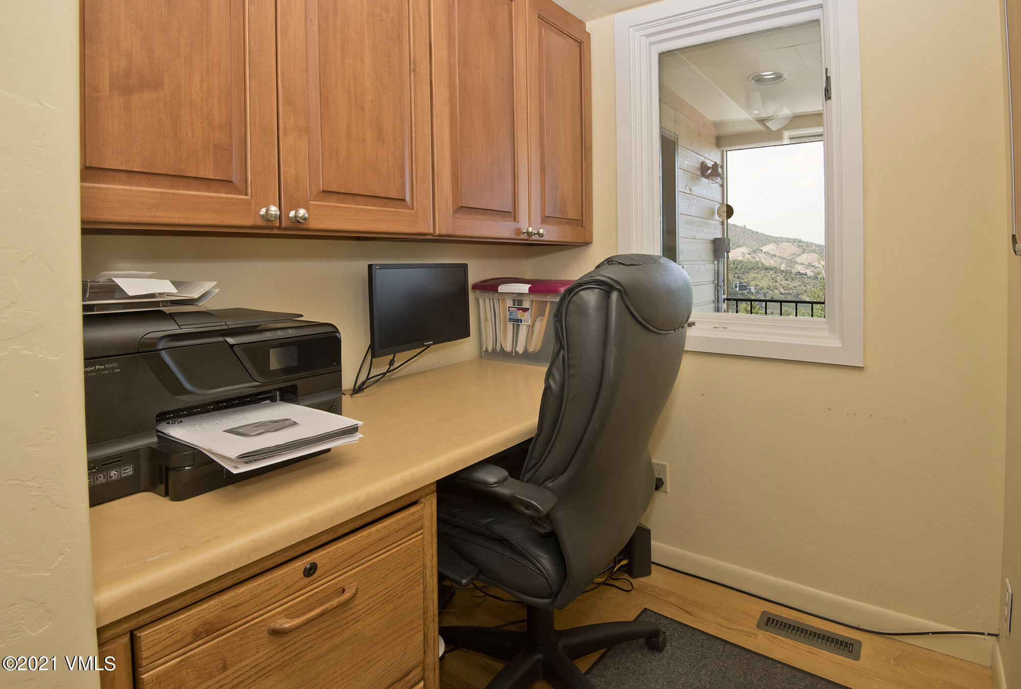 683 Eagle Crest Road Edwards, CO 81632 - Photo 25 of 47 a view of a workspace with furniture and a window