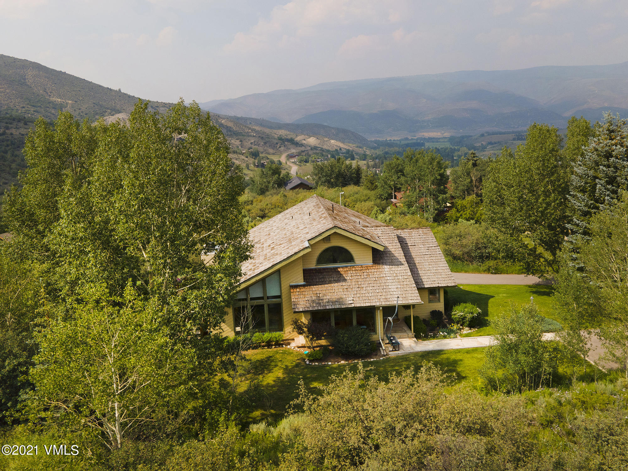 683 Eagle Crest Road Edwards, CO 81632 - Photo 3 of 47 a view of a house with a yard